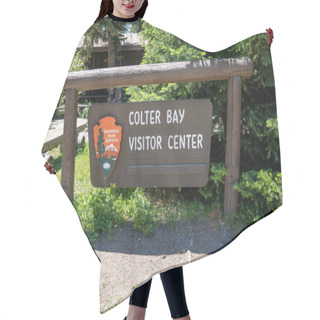 Personality  Wyoming, USA - June 26, 2020: Sign For The Colter Bay Visitor Center In Grand Teton National Park Hair Cutting Cape