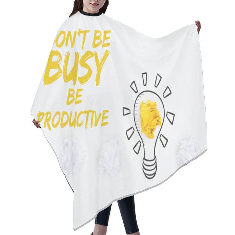 Personality  top view of crumpled paper balls, don't be busy be productive inscription and illustration of light bubble on white background, business concept hair cutting cape