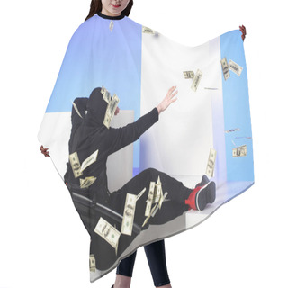 Personality  Back View Of Ninja In Black Clothing Catching Dollar Banknotes On White Blocks Isolated On Blue Hair Cutting Cape