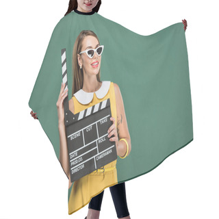 Personality  Beautiful Smiling Stylish Woman In Yellow Dress And Sunglasses Holding Film Clapperboard Isolated On Green Hair Cutting Cape