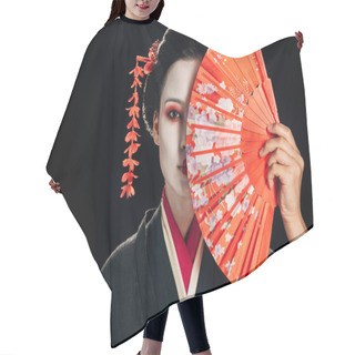 Personality  Attractive Geisha In Black Kimono With Flowers In Hair Holding Bright Hand Fan Isolated On Black Hair Cutting Cape