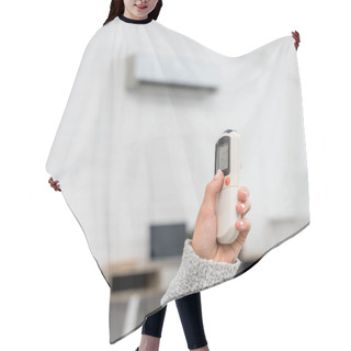 Personality  Cropped Shot Of Woman In Sweater Holding Air Conditioner Remote Control Hair Cutting Cape