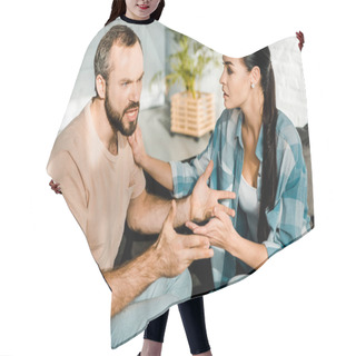 Personality  Couple Having Argument And Wife Trying To Calm Down Angry Husband At Home Hair Cutting Cape