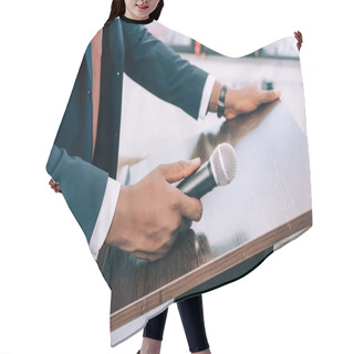 Personality  Cropped Image Of African American Lecturer Standing At Podium Tribune With Microphone In Conference Hall Hair Cutting Cape