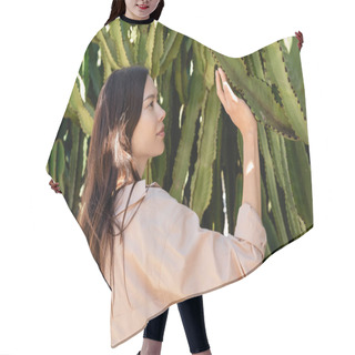 Personality  Side View Of Pretty Woman In Beige Shirt Touching Green Succulents In Park Hair Cutting Cape
