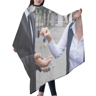 Personality  Cropped View Of Smiling Realtor Giving Key To Businessman Holding Smartphone Outdoors Hair Cutting Cape