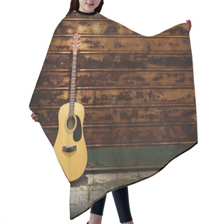 Personality  Acoustic Guitar Against Rusty Gates Hair Cutting Cape