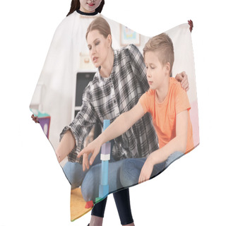 Personality  Young Woman And Little Boy With Autistic Disorder Playing At Home Hair Cutting Cape