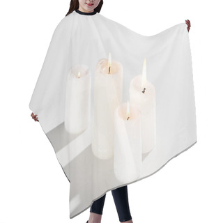 Personality  Burning Candles Glowing On White Background With Shadow Hair Cutting Cape
