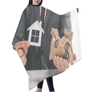 Personality  Cropped View Of Mortgage Broker Holding Paper House And Moneybags Isolated On White Hair Cutting Cape
