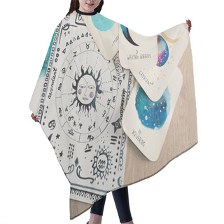 Personality  Top View Of Birth Chart And Cards With Zodiac Signs On Wooden Table Hair Cutting Cape