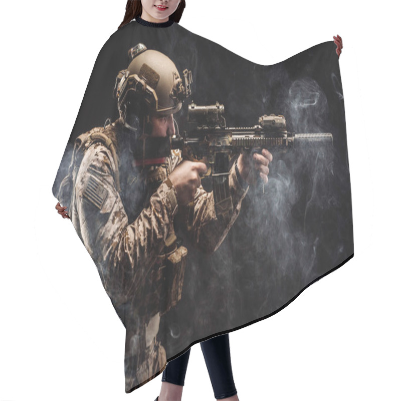 Personality  Special forces United States soldier or private military contractor holding rifle. Image on a black background. war, army, weapon, technology and people concept hair cutting cape