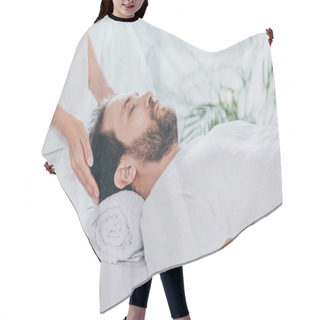 Personality  Cropped Shot Of Man With Closed Eyes Receiving Reiki Treatment Hair Cutting Cape