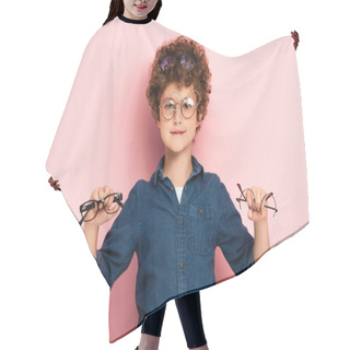 Personality  Joyful Boy Holding Bunch Of Eyeglasses While Looking At Camera On Pink   Hair Cutting Cape