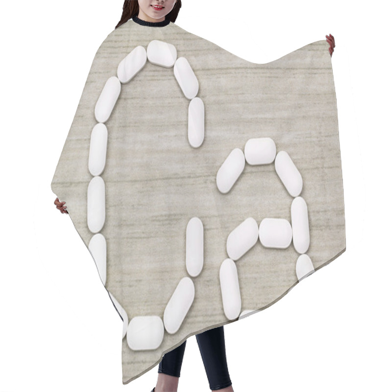 Personality  Calcium Carbonate Tablets In A Symbol Shape Of Ca Alphabet Hair Cutting Cape