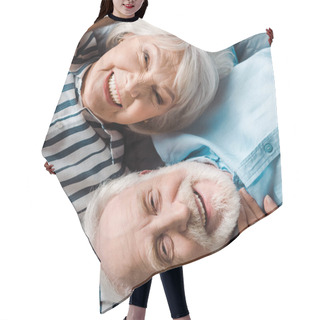 Personality  Top View Of Elderly Couple Smiling At Camera While Lying On Bed Hair Cutting Cape