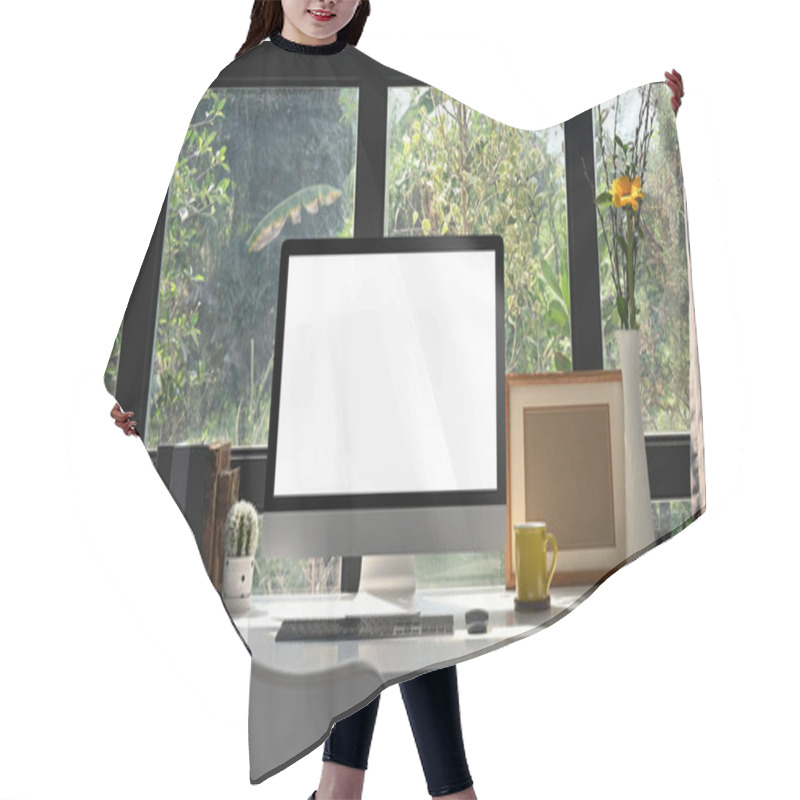 Personality  Front view computer pc with empty display on white table in home office. hair cutting cape