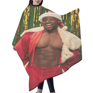 Personality  Sexy Sportive African American Man In Santa Costume On Shirtless Body Near Golden Tinsel On Green Hair Cutting Cape