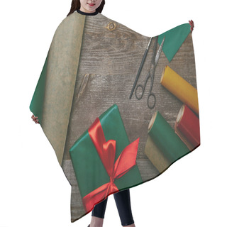 Personality  Flat Lay With Wrapped Christmas Present With Ribbon On Wooden Surface With Wrapping Papers, Envelope And Scissors Hair Cutting Cape