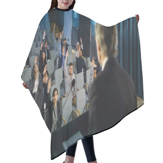Personality  Back View Of Politician Or Activist Pronouncing Speech During Press Campaign In The Conference Hall. Mature Organization Representative Answers Questions, Gives Interview To Journalists For Media. Hair Cutting Cape