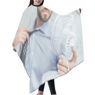 Personality  Cropped View Of Businessman Cooling Himself With Electric Fan   Hair Cutting Cape