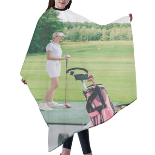 Personality  Side View Of Woman In Polo And Cap With Golf Club Standing At Golf Course Hair Cutting Cape