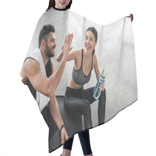 Personality  High Angle View Of Happy Sporty Young Couple Giving High Five While Sitting On Treadmill After Workout In Gym Hair Cutting Cape