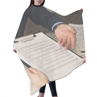 Personality  Cropped View Of Agent Pointing With Hand At Clipboard With Contract Lettering Near Woman With Pen  Hair Cutting Cape