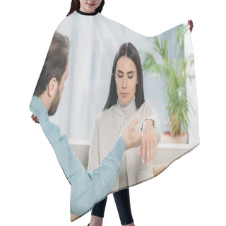 Personality  Bearded Hypnotist Holding Wrist Of Young Woman With Closed Eyes During Hypnotherapy Hair Cutting Cape
