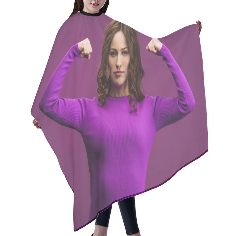 Personality  confident girl demonstrating power on purple background hair cutting cape