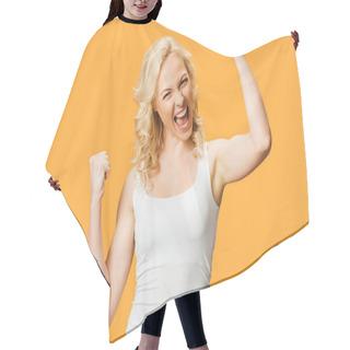 Personality  Happy Blonde Woman Gesturing While Celebrating Triumph Isolated On Orange  Hair Cutting Cape