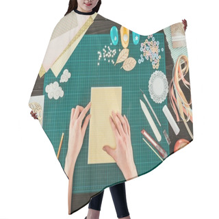 Personality  Cropped Image Of Designer Sitting At Working Table With Template For Scrapbooking Postcard Hair Cutting Cape