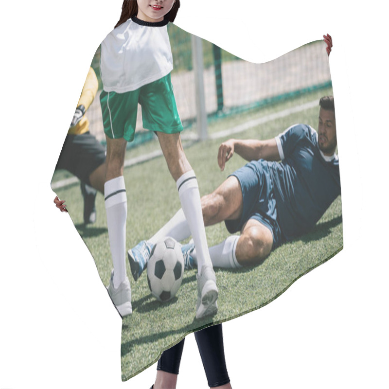 Personality  multiethnic soccer players hair cutting cape