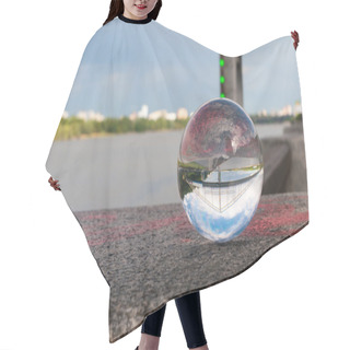 Personality  Glass Transparent Ball On Bridge Background And Grainy Surface. With Empty Space Hair Cutting Cape