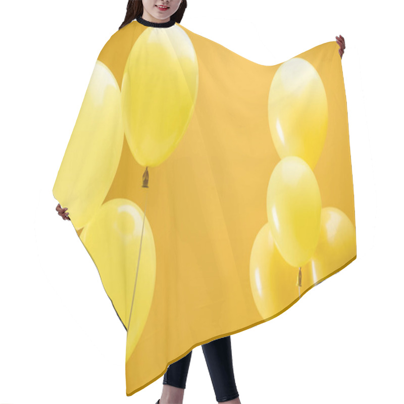 Personality  festive bright minimalistic balloons on yellow background hair cutting cape