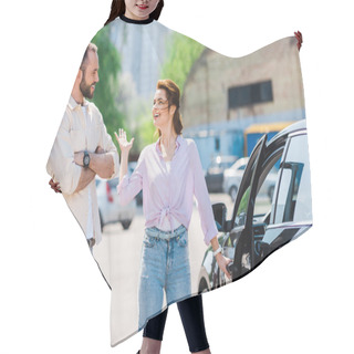 Personality  Happy Woman Gesturing While Holding Handle And Opening Car Near Handsome Man  Hair Cutting Cape