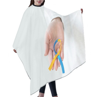 Personality  Female Hand Holding Down Syndrome Day Symbol Blue And Yellow Ribbon Isolated On White Hair Cutting Cape