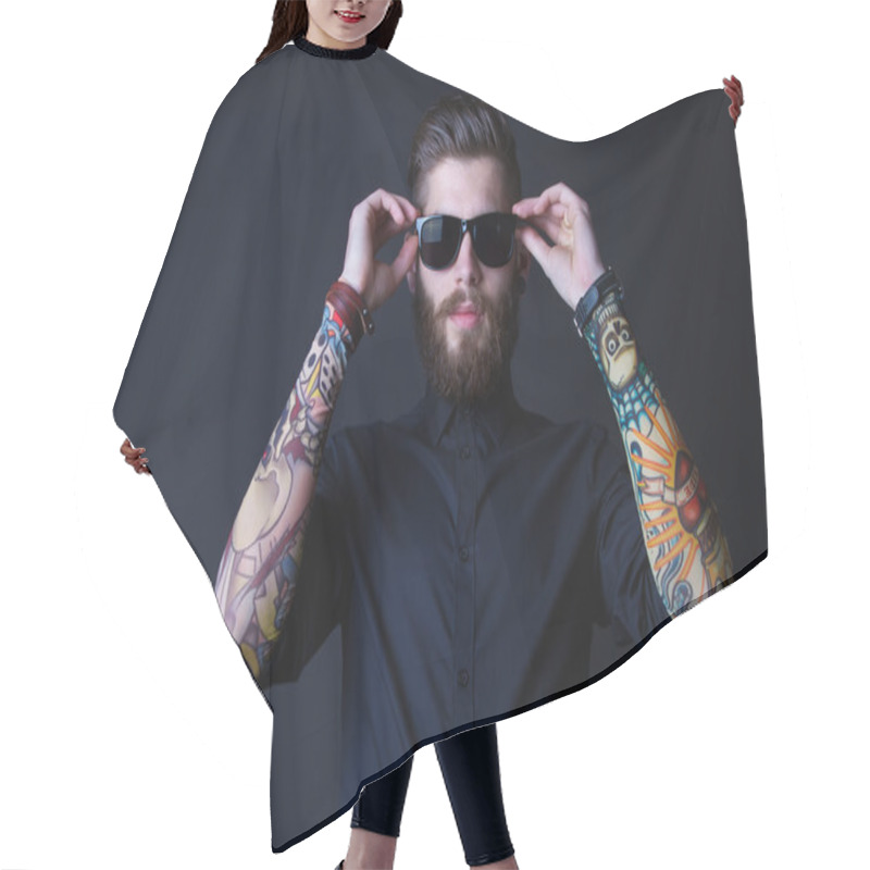 Personality  dhipster portrait with black backround hair cutting cape