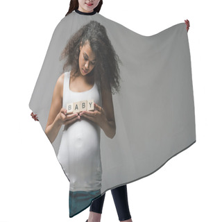 Personality  Pregnant African American Woman Standing And Holding Wooden Cubes With Baby Lettering  On Grey  Hair Cutting Cape