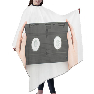Personality  Partial View Of Man Holding Black VHS Cassette On White Background Hair Cutting Cape