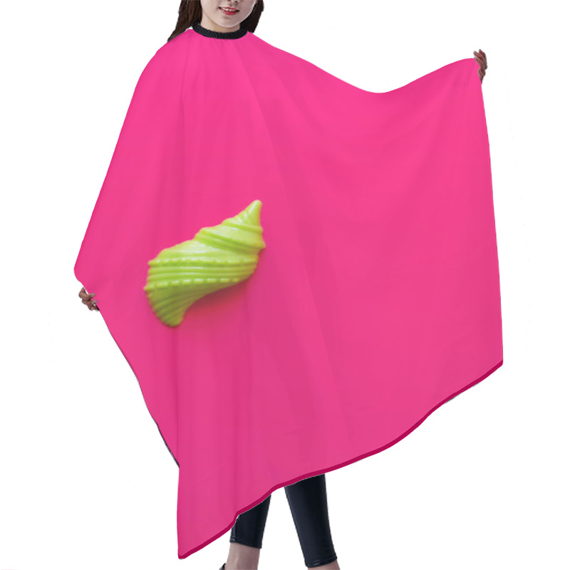 Personality  top view of green sand mold in shape of shellfish on pink background hair cutting cape