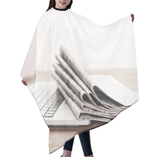 Personality  Laptop And Stack Of Newspapers On Wooden Tabletop Hair Cutting Cape