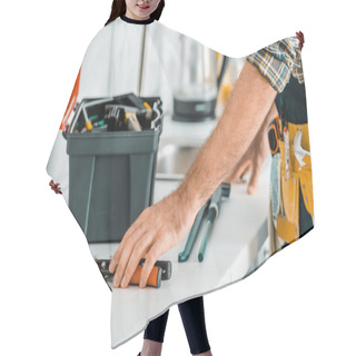 Personality  Cropped Image Of Plumber Putting Tools On Kitchen Counter In Kitchen Hair Cutting Cape