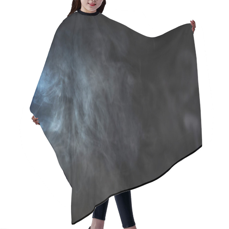 Personality  grey tobacco smoke with blue light on black background  hair cutting cape
