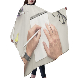 Personality  Cropped View Of Man Writing In Notebook Near Glasses And Stationery Isolated On Grey  Hair Cutting Cape