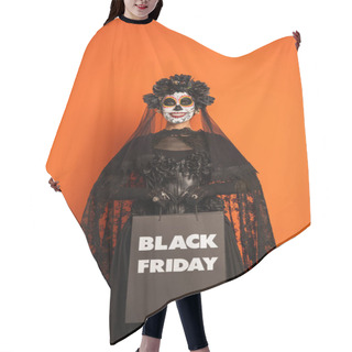 Personality  Smiling Woman In Scary Halloween Makeup And Costume Holding Black Friday Shopping Bag Isolated On Orange Hair Cutting Cape