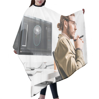 Personality  Side View Of 3d Artist Holding Stylus Of Graphics Tablet And Looking Away Near Project Of 3d Design On Computer Monitors On Table  Hair Cutting Cape
