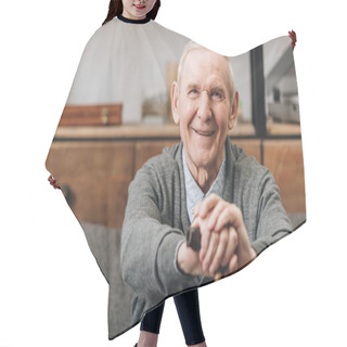 Personality  Cheerful Pensioner Smiling And Holding Walking Cane At Home  Hair Cutting Cape