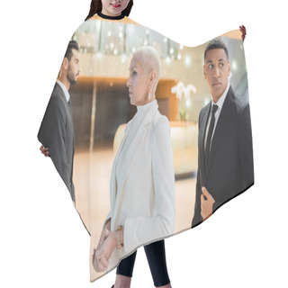Personality  Multiethnic Guards Escorting Senior Businesswoman In Hotel Foyer During Business Trip Hair Cutting Cape