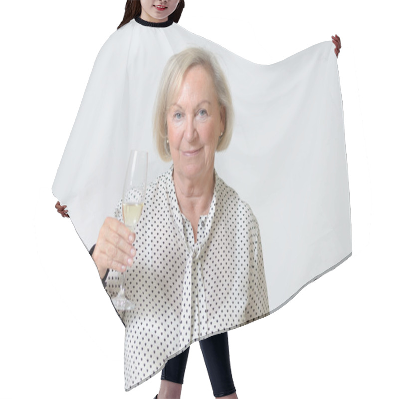 Personality  Senior Woman Toasting With Champagne Hair Cutting Cape